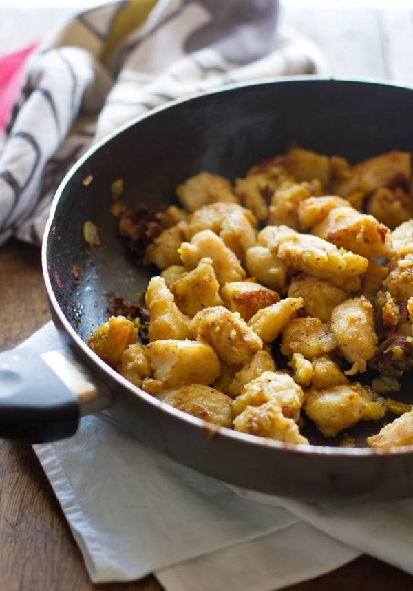 Sweet and sour fish in a skillet.