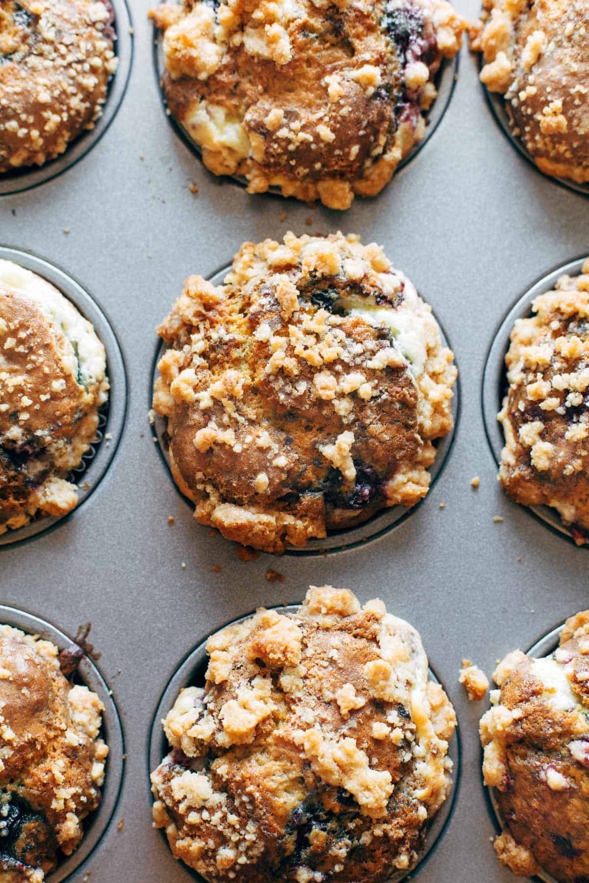 Berry cheesecake muffins in muffin tin.