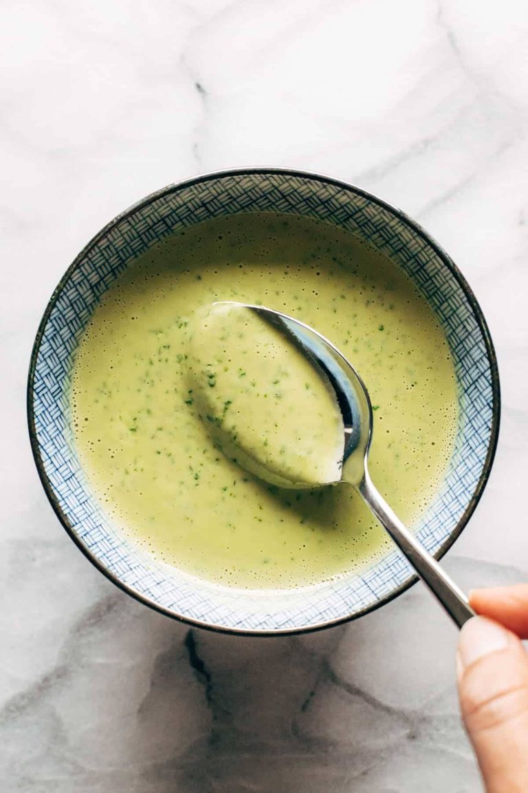 Green tahini in a bowl.