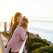 Lindsay's friends look at the Pacific Ocean.