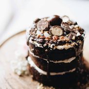 Chocolate cake on a cake stand.