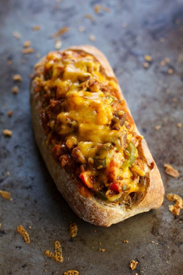 A single piece of pizza bread on a pan.