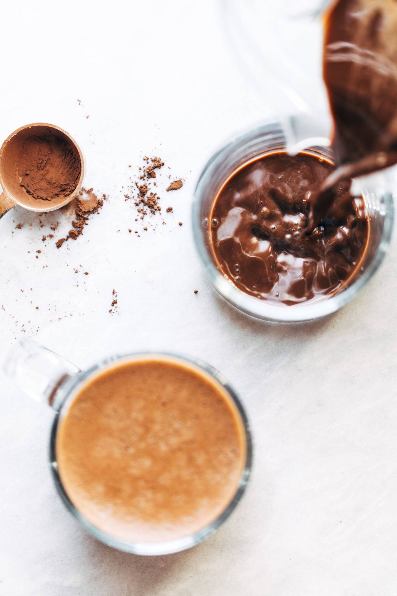 Pouring peppermint mocha into glass.