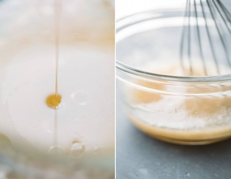 Citrus dressing in a mixing bowl with a whisk.